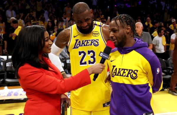 The pair being interviewed after the game.