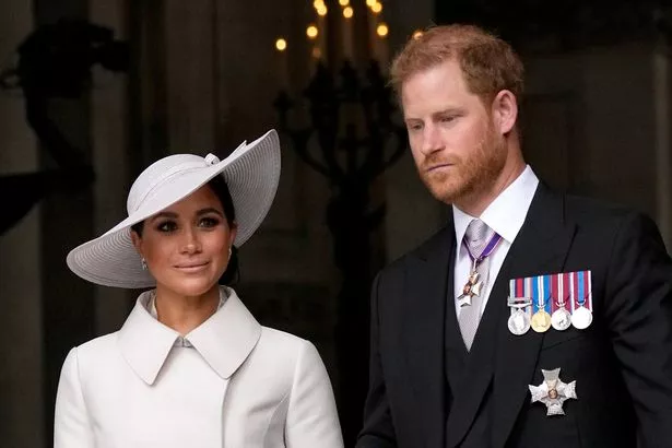 Prince Harry and Meghan Markle 'desperate' to mend royal rift as 'new threat' looms